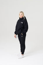 Load image into Gallery viewer, Model is wearing a small top medium bottom